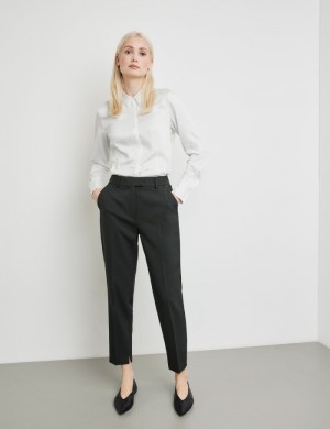 TAIFU 7/8-length pressed pleat trousers in a slim fit Bukser Svarte | OEFF2750