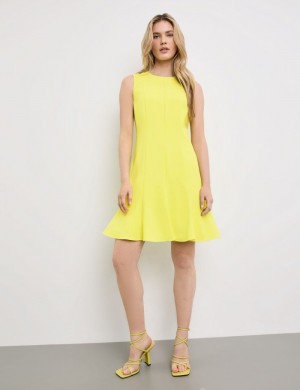 TAIFU Figure-flattering dress with a godet silhouette Kjole Gul | LWUK6801