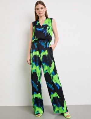 TAIFU Flowing palazzo trousers with a print Bukser Grønn | OXXF3067