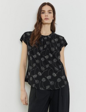 TAIFU Short sleeve blouse with an all-over print Bluse Svarte | LPBX5045