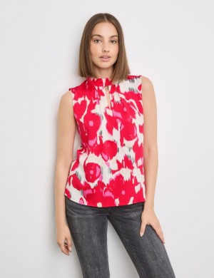 TAIFU Sleeveless blouse with a floral print Bluse Rød | YHUM3929