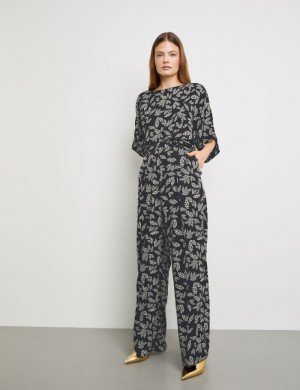 TAIFU Wide palazzo trousers made of satin Bukser Svarte | LPSO9550