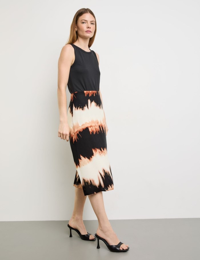 TAIFU Flared midi skirt with a print Skjørt Brune | SFUB1160