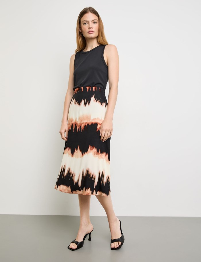 TAIFU Flared midi skirt with a print Skjørt Brune | SFUB1160