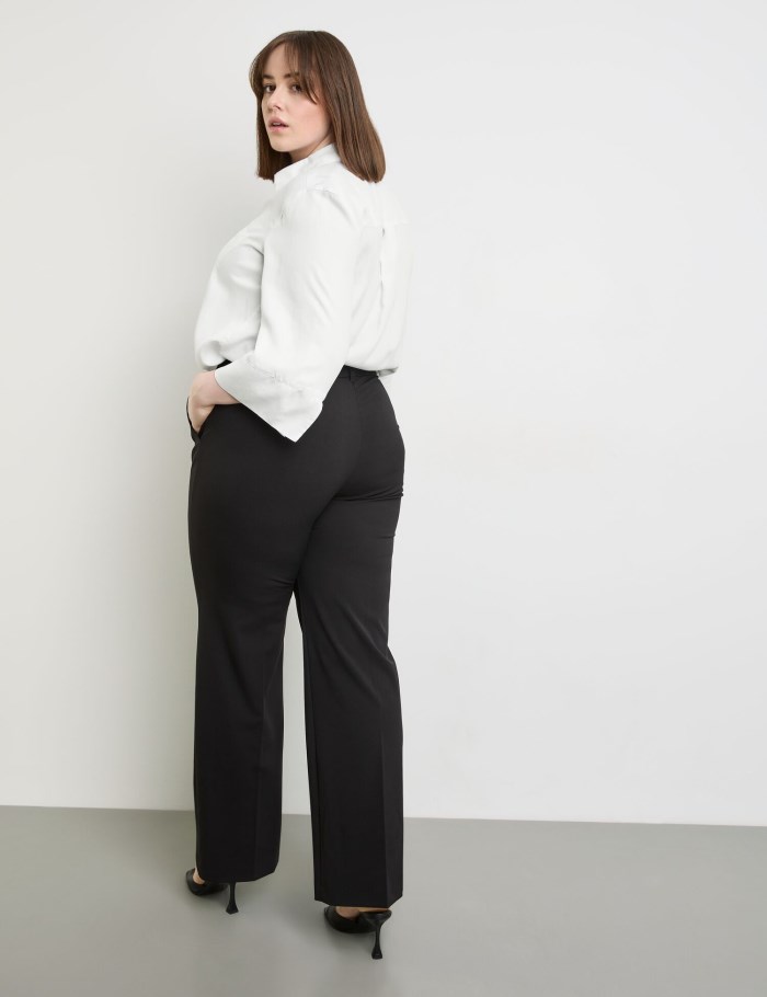 SAMOON Smart pressed pleat trousers with a wide leg, Carlotta Bukser Svarte | HEWF2452