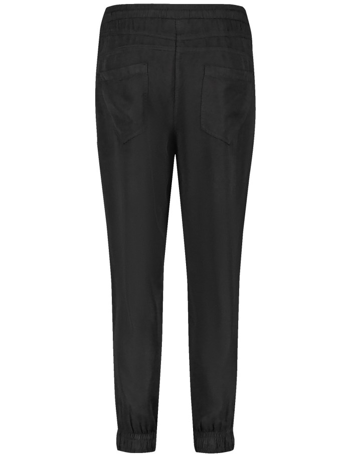 TAIFU Tracksuit bottoms with a drawstring Bukser Svarte | JACN0623