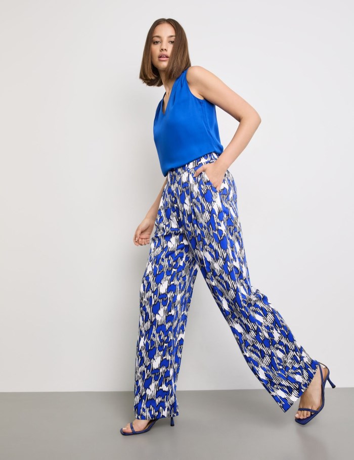 TAIFU Wide palazzo trousers with an all-over print Bukser Blå | PRNZ5659