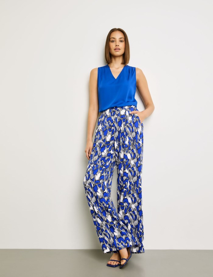 TAIFU Wide palazzo trousers with an all-over print Bukser Blå | PRNZ5659